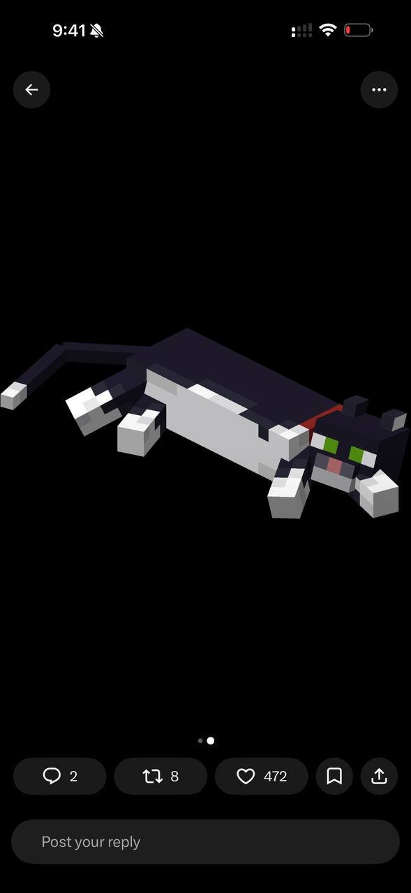 The Minecraft cat lying down